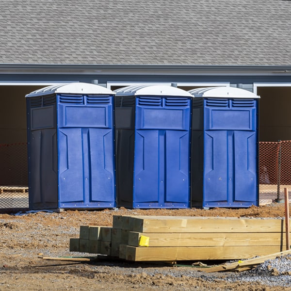 what is the cost difference between standard and deluxe portable toilet rentals in Roscoe Minnesota